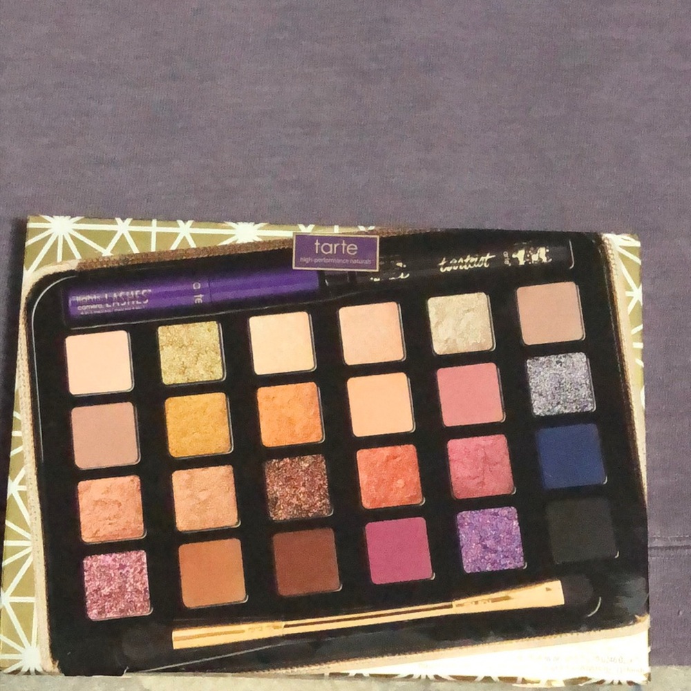 Tarte- eyeshadow, mascara, eyeliner and brush set.